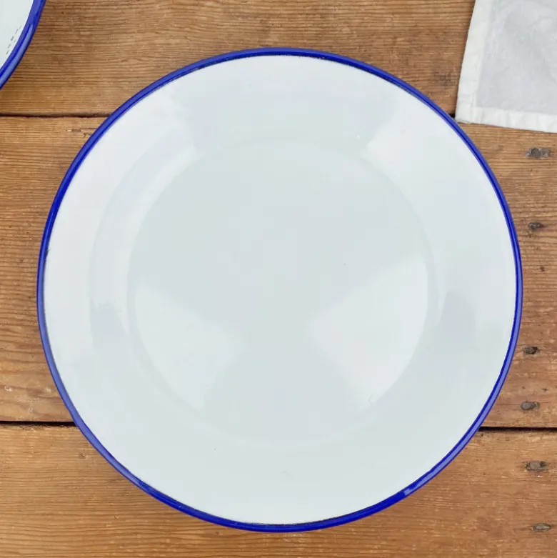 Assiette en émail blanc liseré bleu