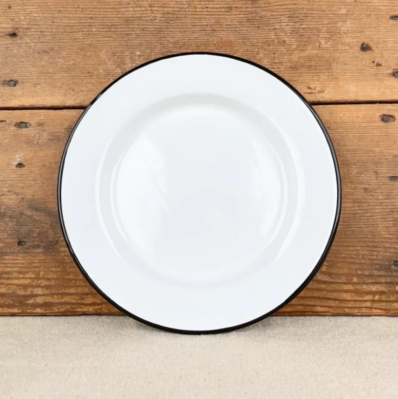 Assiette en émail blanc liseré noir