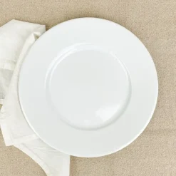 Assiette plate en émail blanc