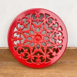 Dessous de plat en fonte rouge