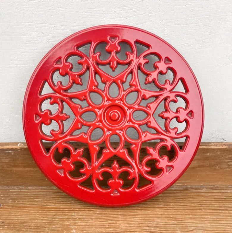 Dessous de plat en fonte rouge