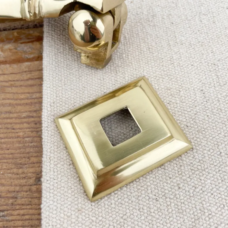 Heurtoir de porte main en laiton