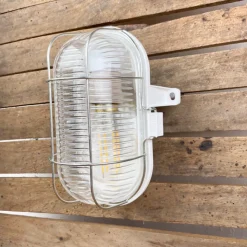 Lampe hublot en bakélite pour salle de bain