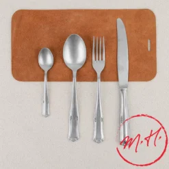 Ménagère 24 pièces en étain orné