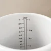 Pot mesureur émail blanc