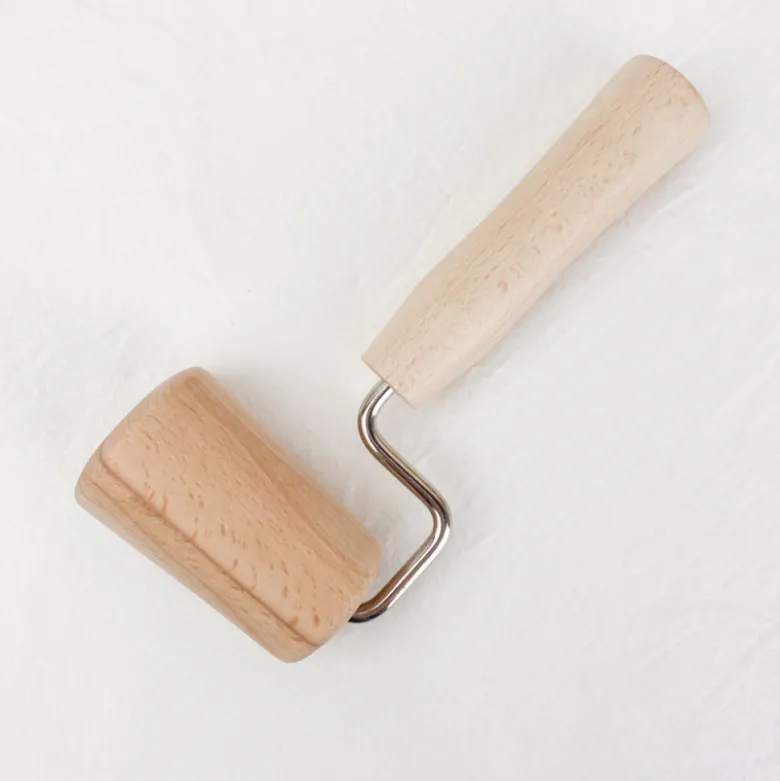 Rouleau conique à étaler la pâte