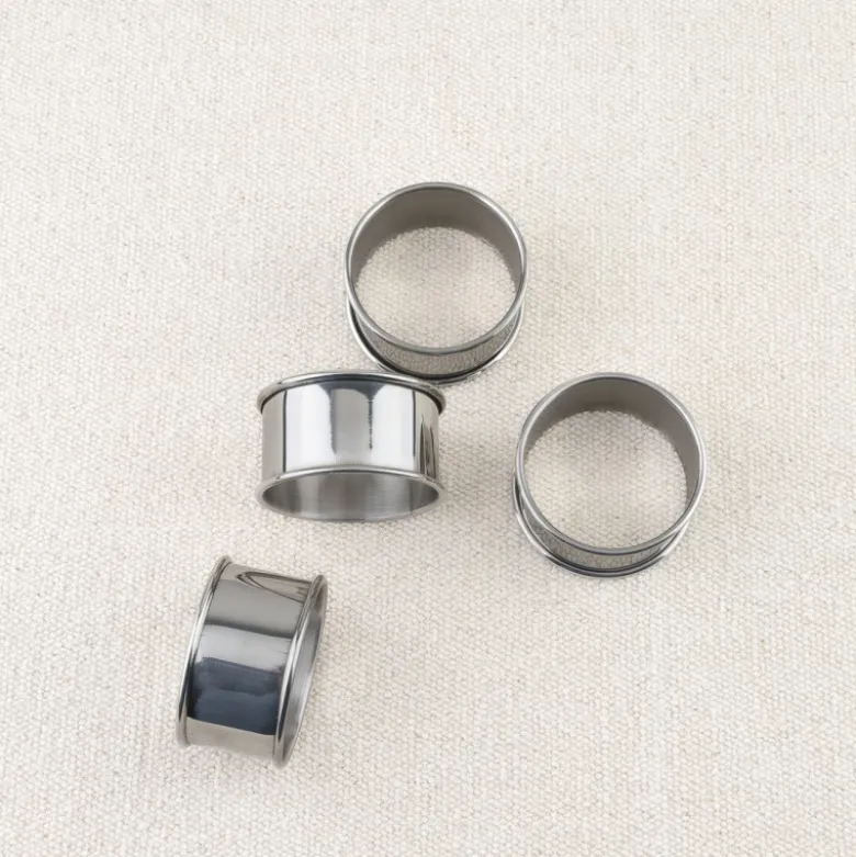 Set de 4 ronds de serviettes en inox