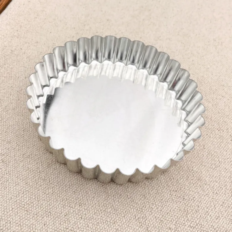 Tartelette en fer blanc à fond mobile