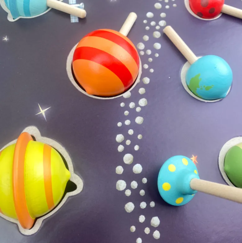 Toupies planète en bois