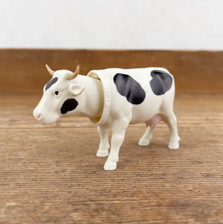 Vache qui hoche la tête