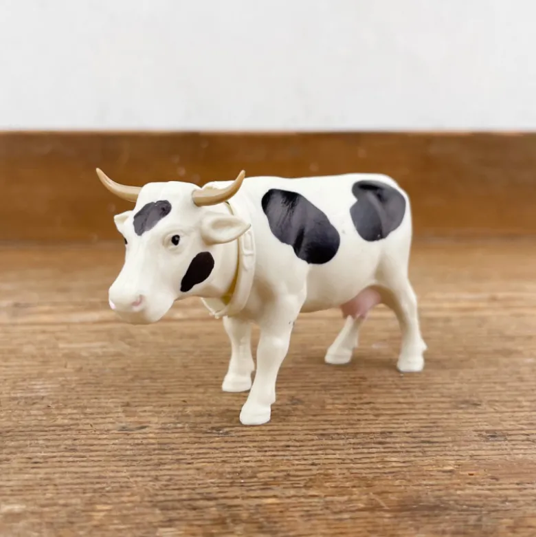 Vache qui hoche la tête