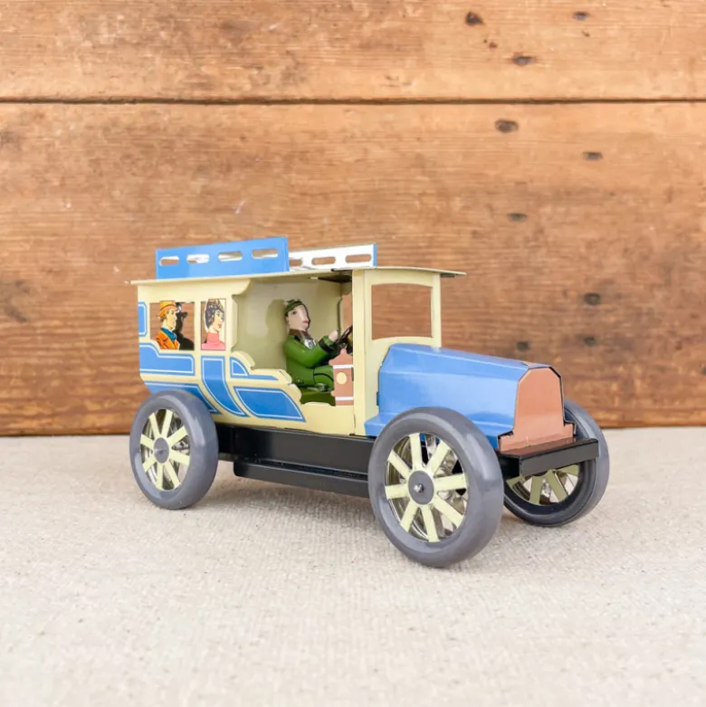 Voiture limousine beige et bleue mécanique